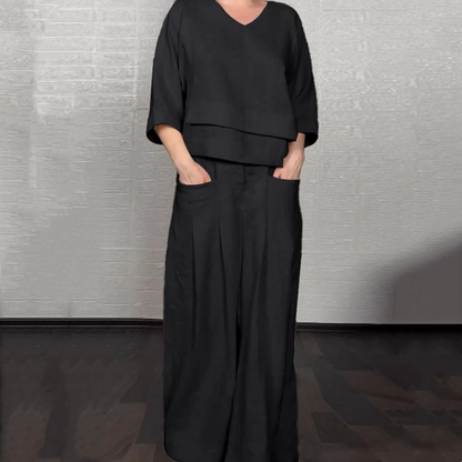 💎 2-piece cotton-linen set with an uneven hem – V-neck top + wide-leg pants, breathable & effortlessly stylish 🍂👚