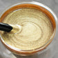 Weather-resistant water-based gold paint